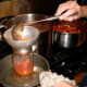 Ladle jam into jars, leaving 1/4" headspace. Wipe rims absolutely clean, then adjust two-piece caps finger-tight.