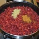 Step four: Add all the spice powders and remaining salt. By now, the mixture should be thick.