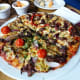Australia's most famous animal is the kangaroo, and some Australians think kangaroos make a delicious pizza topping.
