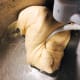 Increase the speed and mix until the dough comes together.