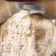 In a mixing bowl, combine the yeast mixture and the dry ingredients. Mix at a lower speed.
