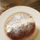 Fill the middle with whipped cream and sprinkle some icing sugar on top.