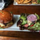 Presentation of burger and salad