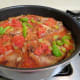 Pork ribs nestled into the vegetable mixture
