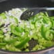 Add the chopped and sliced vegetables (except garlic) to the pan after the pork chops are browned and removed