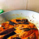 Continue stirring and let the sauce simmer.