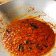 Let the curry powder fry for a few minutes.