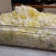 Two heads of chopped Chinese cabbage fills this large container to overflowing.