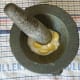Pound salt and garlic to a smooth paste with a mortar and pestle.