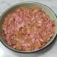 Form the dongcai pork mixture into a pattie onto a heat-proof plate.