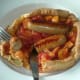 Tucking in to chicken sausages and spicy vegetables in giant Yorkshire pudding