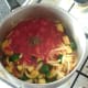 Tomatoes are added to sauteed vegetables