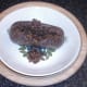 Haggis is carefully cut open for serving