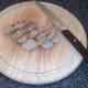 Cooked and cooled chicken sausages are moderately finely sliced