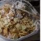 Add more apples. Fold and coat.