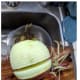 apple gets peeled and sliced and cored in one easy swoop