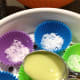 Pour the batter into the prepared molds.