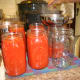 When finished, pour the sauce into pre-warmed canning jars.