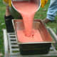 Pour the sauce into catering pans that will be placed on the outdoor evaporator.