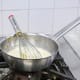 Almond milk and pistachio paste in a sauce pan (Step 5).