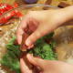 Break Kit Kat chocolates into small chunks.