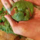 Roll dough into balls, flattening them slightly.
