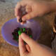 Separate green and brown M&M's into a bowl.