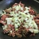 Fry the beef and onions.