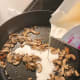 Add the heavy cream into the pan.