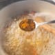 Add the turmeric powder.