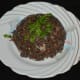 Serve it garnished with chopped coriander leaves and some ghee on top.