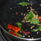 Step 1: In a deep-bottomed pan, make a tempering as per instructions.