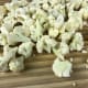 Divide the cauliflower florets into bite-sized pieces.