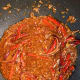 Combine the soy sauce, honey, dried chilies, salt, and pepper.