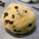 Combine the raisins into the dough. Knead until the raisins are combined with the dough.