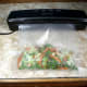 Just before bag of food is processed by Slaouwo V2 Vacuum Sealer.