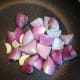 Heat oil in a pan. Add onion and garlic.