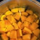 Cut the pumpkin into chunks and throw them into a pot filled with water.