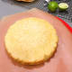Assemble the cake: Remove the parchment paper from both cakes.