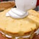 Place the second cake on top. Use the same spatula to spread the frosting on top.