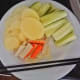 This how my Chinese friend sliced the potato, it's so thin that it will cook in 2 minutes. She also sliced crab sticks and luffa gourd.