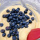 Combine the blueberries and use a spatula to slowly combine.