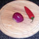 Red onion half and red chilli