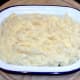 Mashed potato spread over pie filling