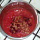 Beans are added to tomato sauce