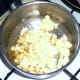 Mash is added to softened onion