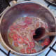 Sauteing red onion and chilli in butter