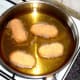 Frying cocktail sausage potato croquettes