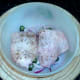 Seasoned chicken thighs ready for baking
