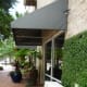 Side of the restaurant with potted plants